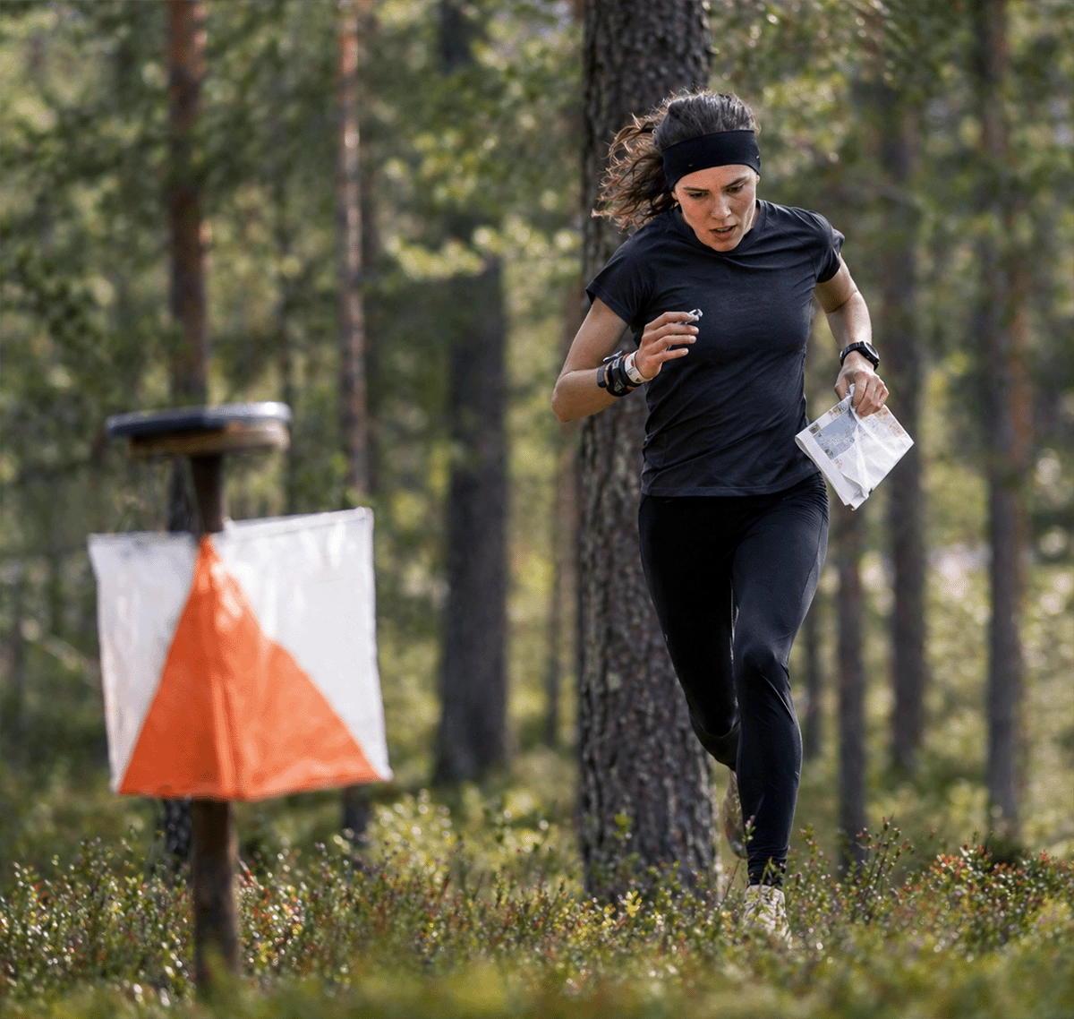 Runner navigating through the forest