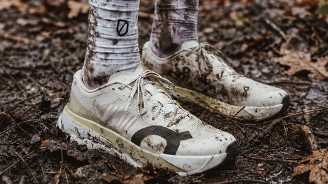 Mud-covered running shoes